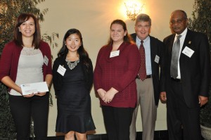 CTCPA Educational Trust Fund Trustee Katherine McNair, CPA (left) presents grants to the University of Connecticut Accounting Department, Accounting Society, and Beta Alpha Psi chapter.  Accepting the awards are University of Connecticut representatives (from left) students Grace Kim, Sarah Levis, Instructor-In-Residence and Assistant Department Head for Undergraduate Programs David Papandria, and Professor and Accounting Department Head Dr. Mohammed Hussein.